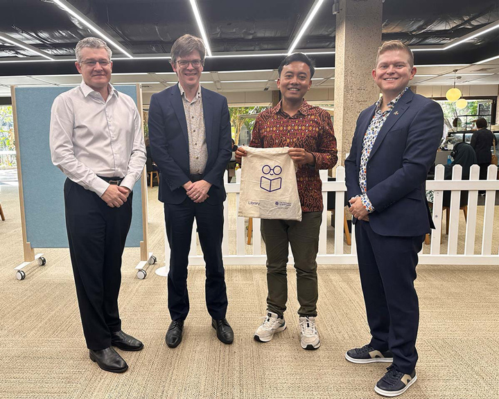 Professor Pierre Benckendorff (Deputy Dean, UQ Graduate School); Professor Kris Ryan, Deputy Vice-Chancellor (Academic); Rian Mantasa and Jeff Cruz, Director, Library Student Experience, UQ Library.