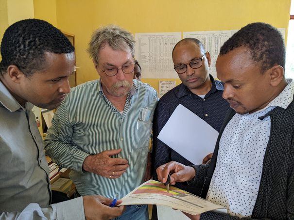 Yibeltal visit to Ethiopia - at a health post reviewing clinical protocols