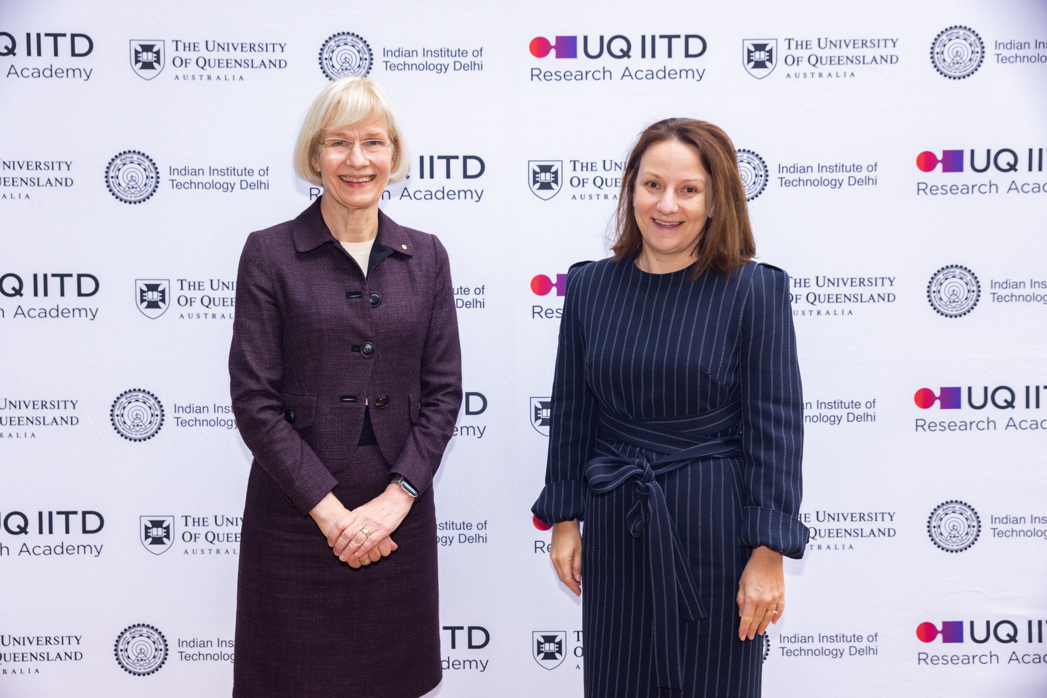UQ VC Professor Deborah Terry AC and Professor Kerrie Wilson standing next to each other for a photo.