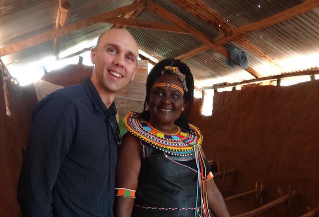 Dr David Smerdon with a community member.