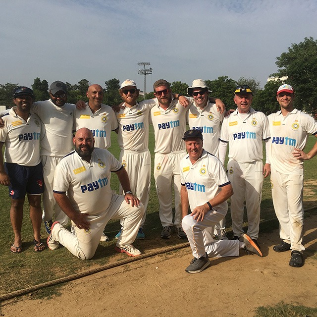 Zachary (fourth from left) with fellow cricketers 