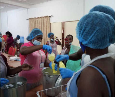 Martha's class on making yoghurt - all women have hair nets and masks