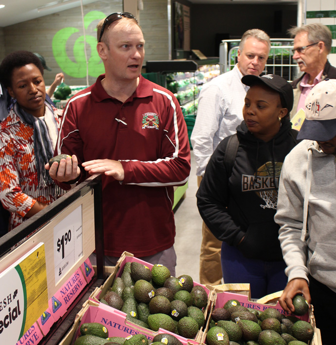 Dr Dent and Emeritus Prof Collins with students in Australian food market