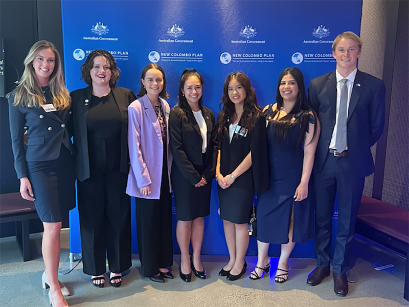 Seven New Colombo Plan Indonesia scholars standing together at the presentation ceremony
