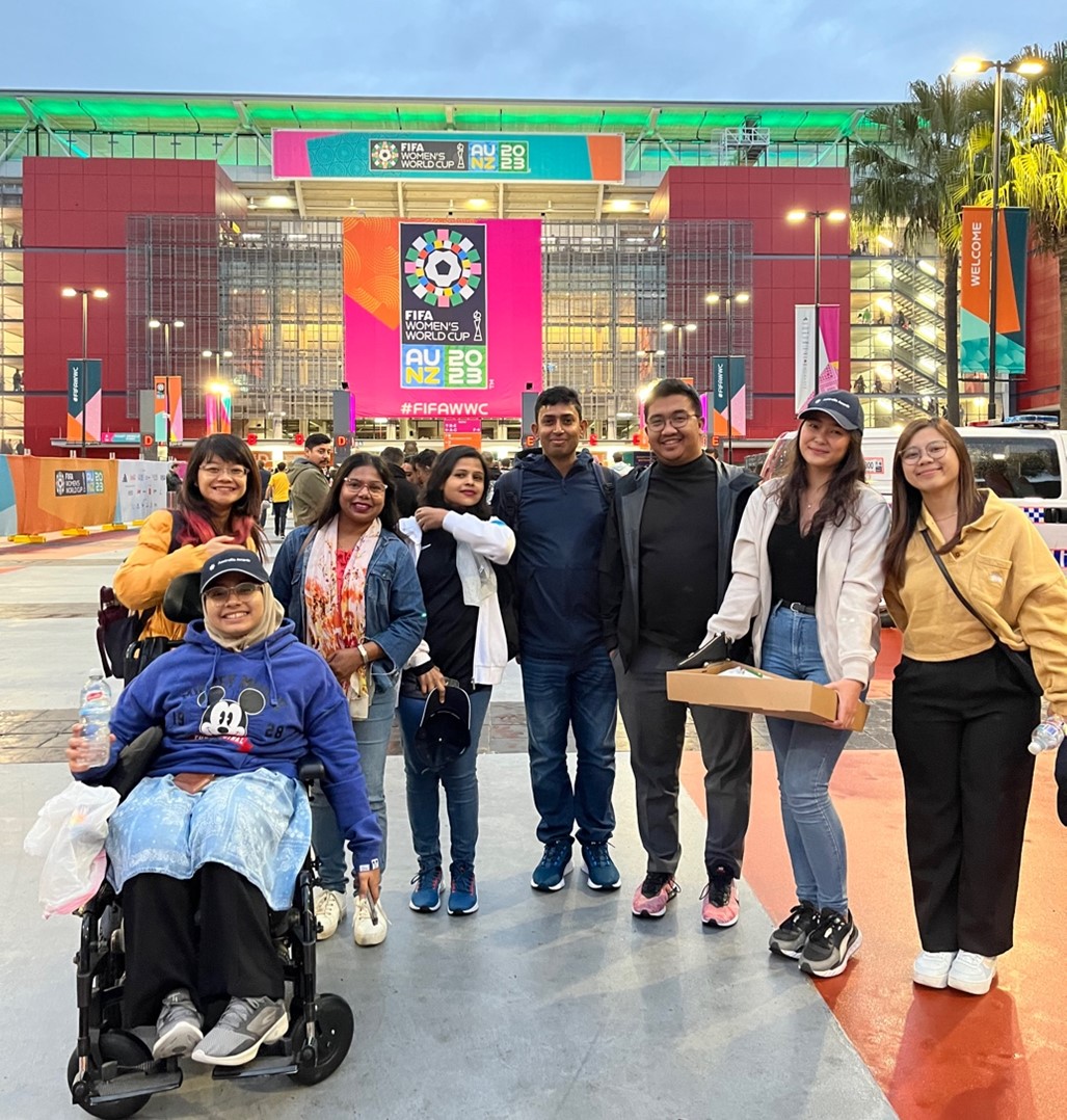 Students infront of Brisbane's Suncorp Stadium for the 2023 FIFA Women's World Cup