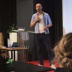 Michael Meriade presenting in China