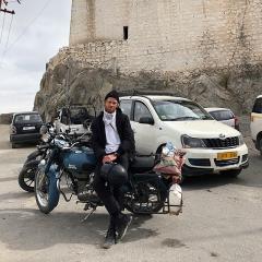 Zachary riding his rented Enfield.