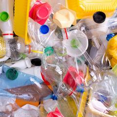 discarded plastics piled up atop one another 