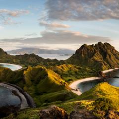 Kokodo Islands Indonesia - dying light of the day over mountaineous island surrounded by ocean