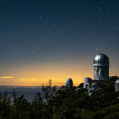 The Mayall 4-Meter Telescope, home to the Dark Energy Spectroscopic Instrument (DESI), seen at night at Kitt Peak National Observatory in Arizona. Credit: LBL/Marilyn Sargent.