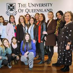 participants from across Latin America standing in front of University of Queensland logo