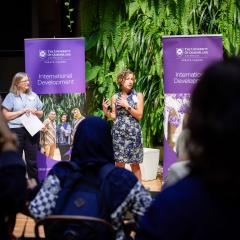 UQ staff speaking at a panel