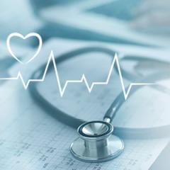 doctors stethoscope with heart monitor line overlayed