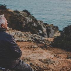 Man looking out to sea. 