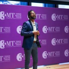 Person pitching at the 3MT Competition