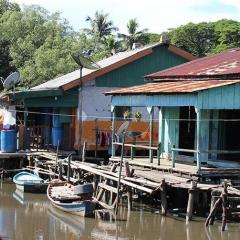 Wooden buildings on riverbank