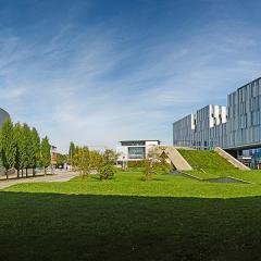 Technical University of Munich TUM grounds with manicured lawn, trees in lines and buildings