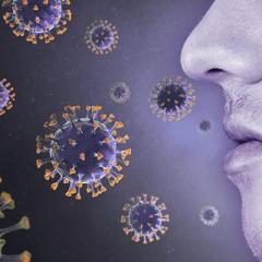 Man's profile surrounded by COVID-19 virus cells