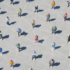 Excellent image of people on geometric lines on the ground - standing evenly seperated on the point where the lines intersect